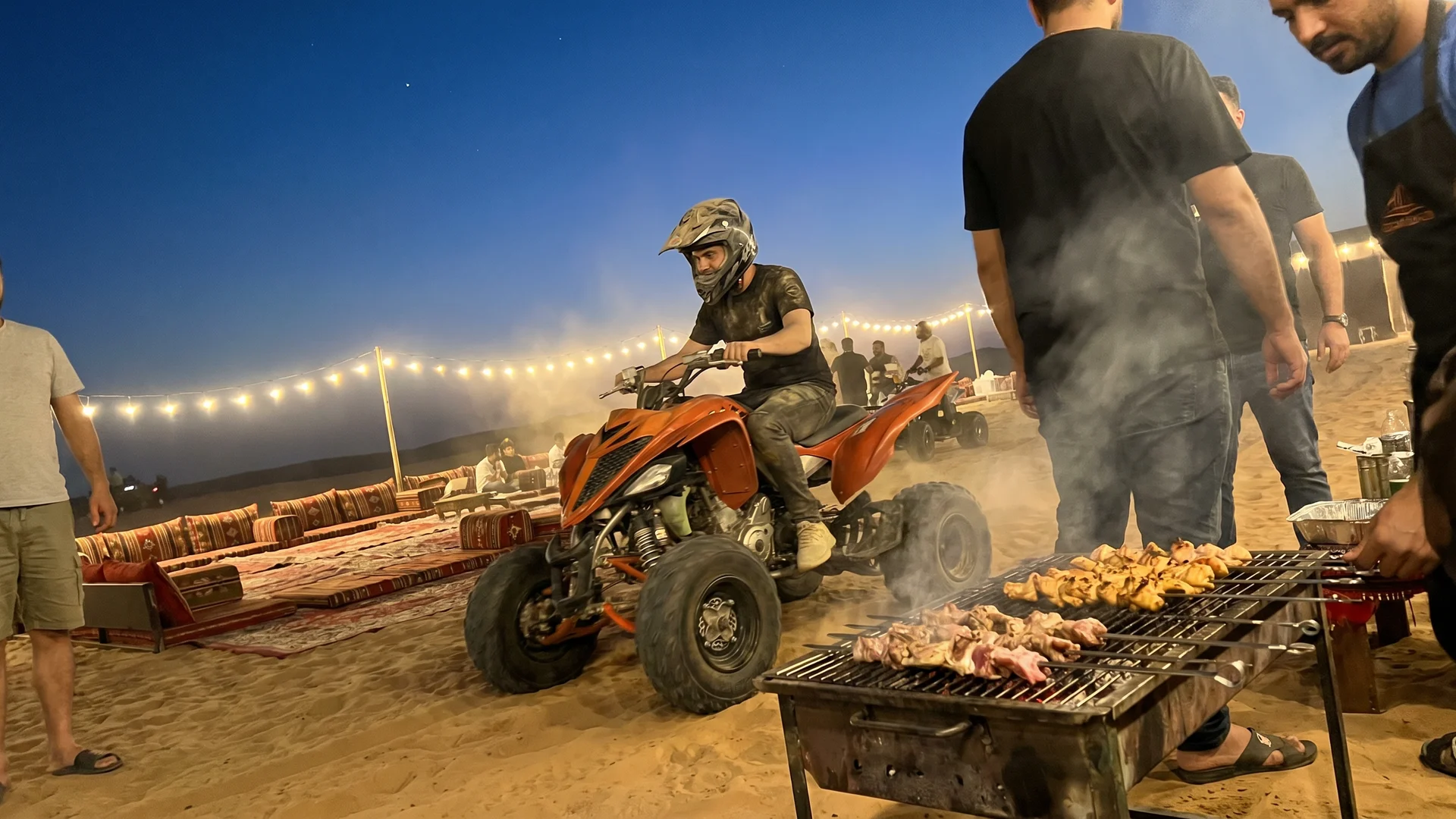 Evening desert safari with quad bike ride and BBQ dinner near Dubai