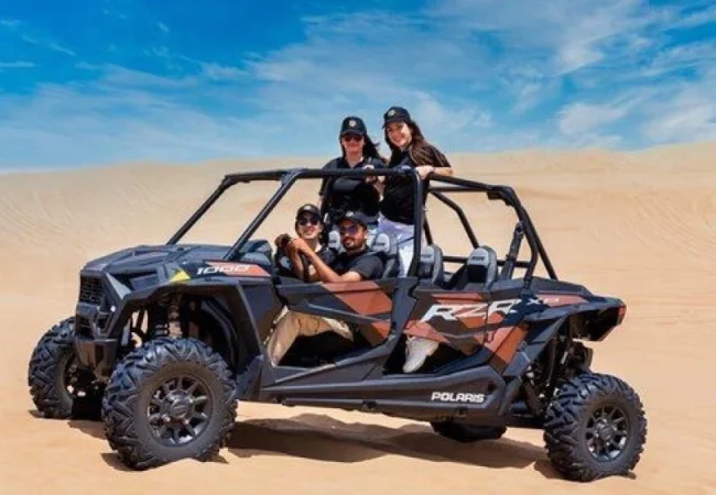 Polaris RZR four-seater family dune buggy in the Dubai desert