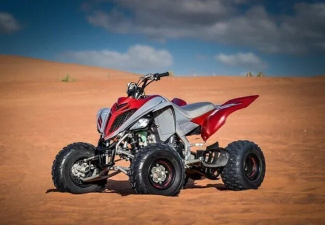 Yamaha Raptor 700cc advanced quad bike in the Dubai desert